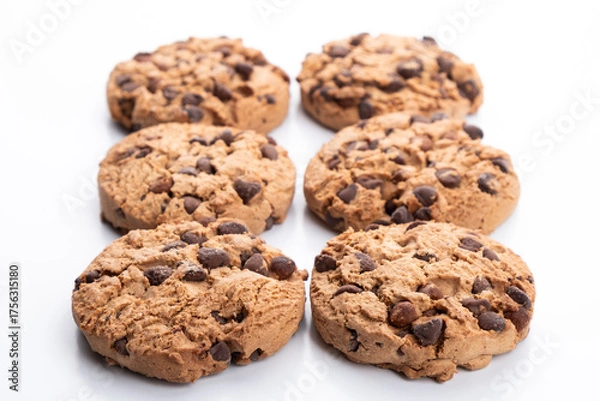 Fototapeta group of chocolate chip cookies on a white background
