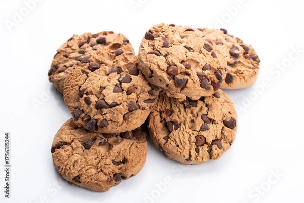 Fototapeta group of chocolate chip cookies stacked on a white background