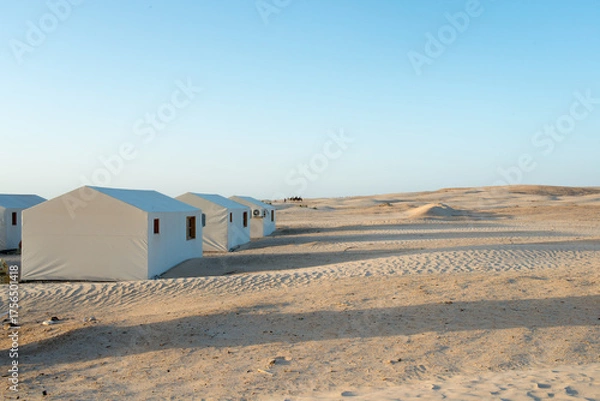 Fototapeta Tents in  a row, accommodation for tourists, Sahara desert, Tunisia