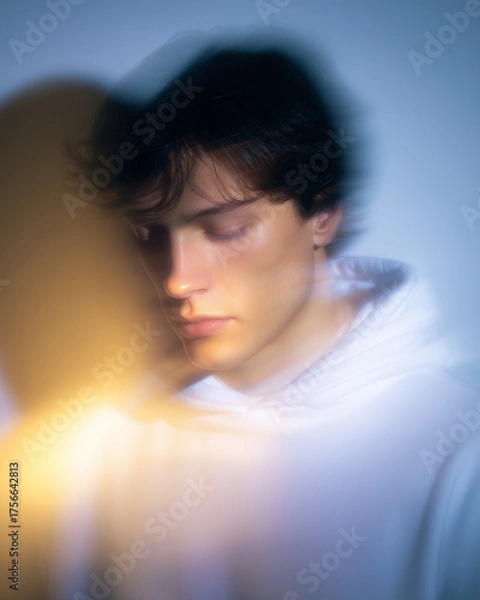 Obraz Dramatic Male Portrait with Soft Light and Motion Blur