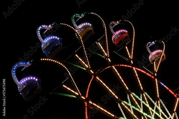 Obraz Low Angle View of illuminated Carousel in Darkness