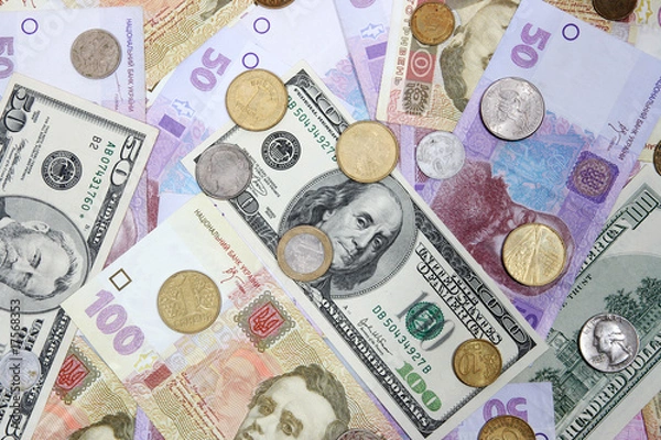 Fototapeta Ukrainian and American money is a background, texture,