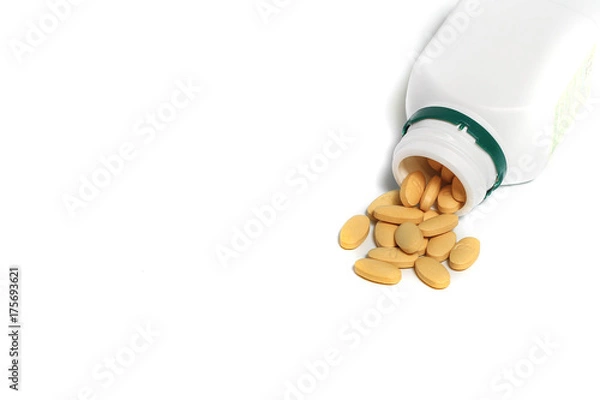 Obraz Pills on a white background.