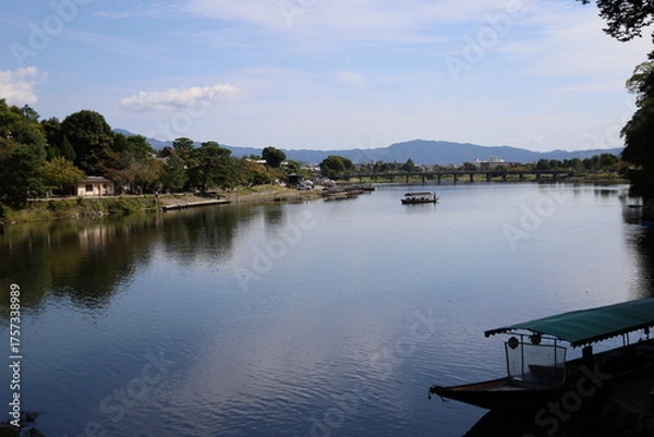 Fototapeta A Japanese bridge: a scene of Togetsu-kyo Bridge at Arashiyama in Kyoto City