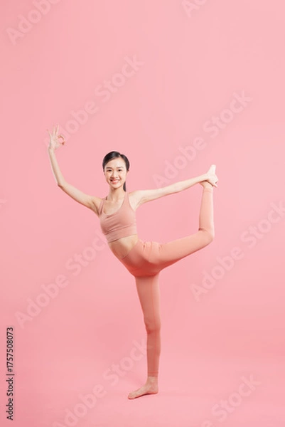 Fototapeta A yoga pose for flexibility balance and mindfulness promoting fitness and well-being