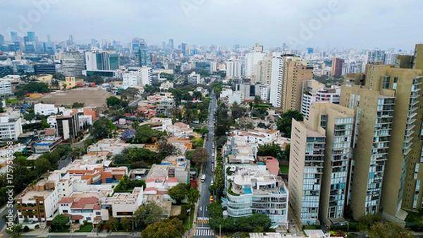 Fototapeta Avenue in the luxury district of San Isidro, Lima on a cloudy winter day.