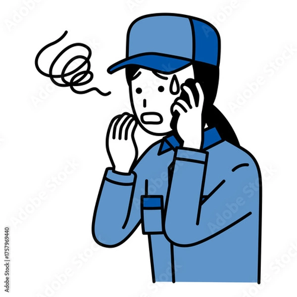 Obraz スマートフォンでの通話で困惑するつなぎ作業服の女性