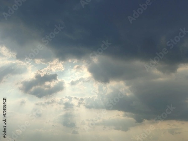 Obraz Sunlight breaking through the dark clouds