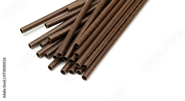 Obraz Close up of numerous brown tubes against a white backdrop isolated