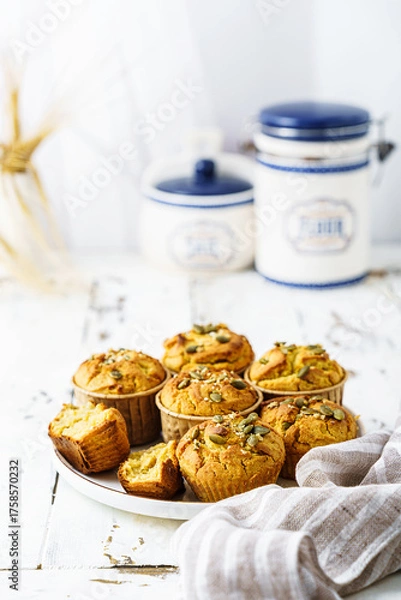 Fototapeta pumpkin muffins on a light background on a plate