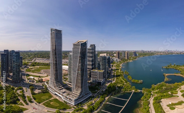 Fototapeta Aerial view of waterscapes condos at Marine Parade Drive near Humber Bay Park and close to the Ontario lakefront in Etobicoke. Mimico scenic waterfront parks for leisure and fishing. Toronto West.