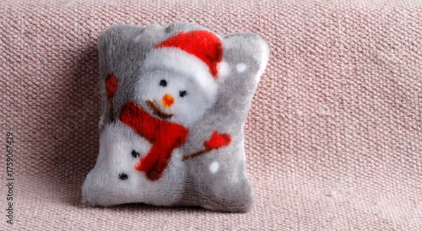 Obraz Cushion with snowmann on a sofa
