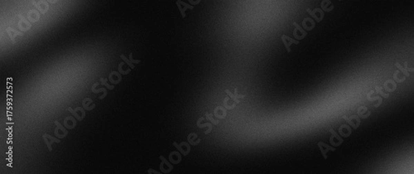 Fototapeta black, opaque background with fine grain texture noise. perfect abstract background often used in graphic design, photography, or as wallpaper.