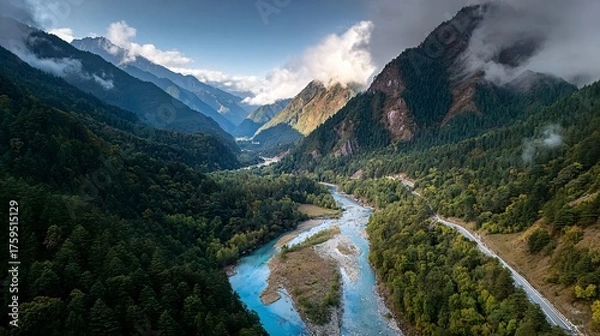 Fototapeta Aerial View of a Lush Valley with a Turquoise River Winding Through Dense Forests and Majestic Mountains