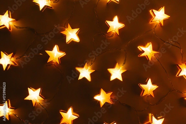 Obraz Star shaped Christmas lights. Holiday pattern. Flat lay, top view