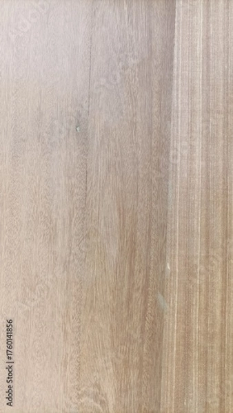 Fototapeta Natural light brown wood texture with fine grain pattern, perfect for background, design, and natural material concepts.