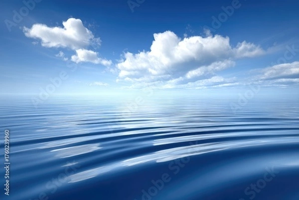 Fototapeta Calm ocean, bright sky, fluffy clouds
