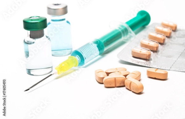 Fototapeta Medical syringe and phials