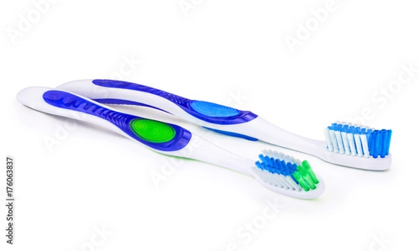 Obraz Две бело синих зубных щетки на изолированном белом фоне