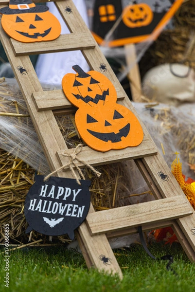 Fototapeta Warm autumn Halloween setup with Pumpkins and Spooky Decorations. Happy Halloween!