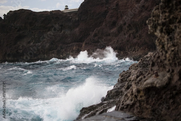 Fototapeta cliffs with crashing waves