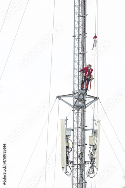 Obraz engineer work on communication tower