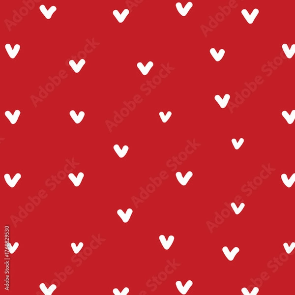 Fototapeta Soft seamless pattern with red hearts. Gift print for the celebration of love. Small hearts for textiles, gift wrap, and design. Heart ornament