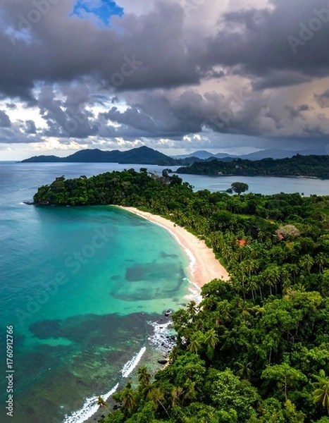 Fototapeta Tropical bay with white sand beach, dense jungle, and dramatic clouds