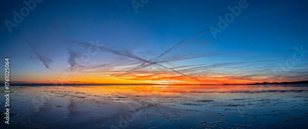 Fototapeta Traumhafte Lichtstimmung über der Nordsee als Panoramaaufnahme