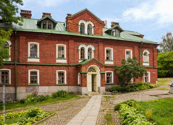 Obraz Former cell housing with a refectory, early 20th century, at the Resurrection Skete of the Valaam Monastery on Valaam Island in the Republic of Karelia. View from the southwest