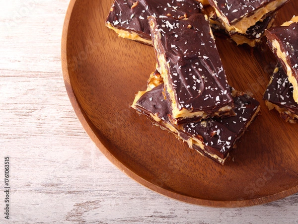 Fototapeta  diet bars made of dates, peanut butter and chocolate
