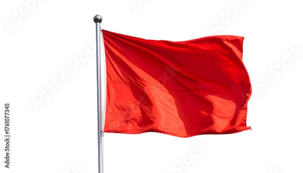 Fototapeta A solid red flag on a pole, billowing in the wind, against a stark black background
