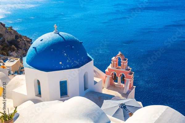 Fototapeta The charming Greek-Catholic church Three Bells of Fira on the Santorini Island, Aegean Sea, Greece