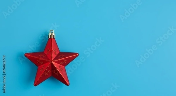 Obraz Red Star Ornament on a Bright Blue Background.
