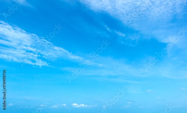 Fototapeta Blue sky background with tiny cloudsbe used as background.