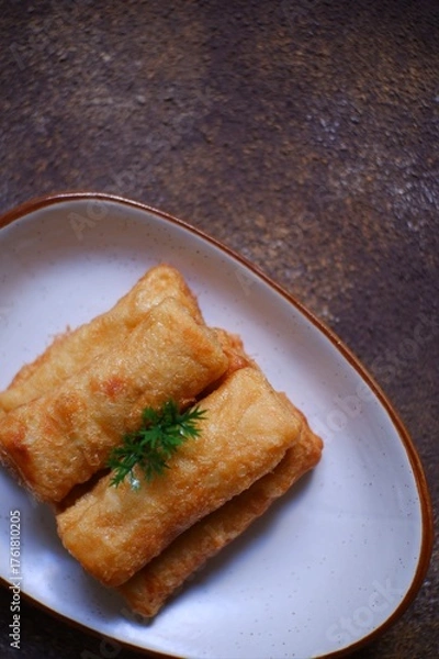 Obraz A plate of fried sosis solo in dark background 