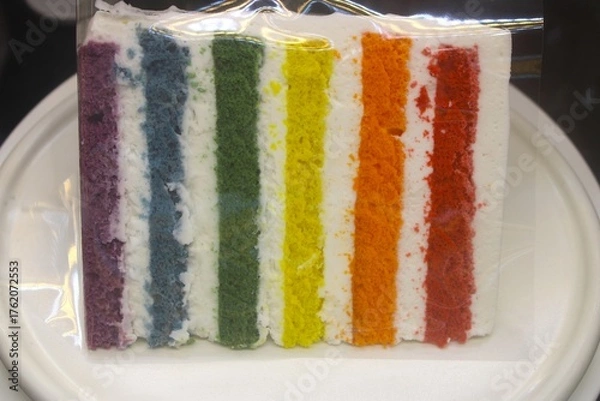 Obraz Slice of rainbow layer cake