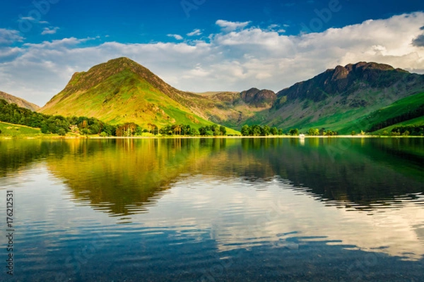 Fototapeta Stunning sunset at lake in District Lake in summer