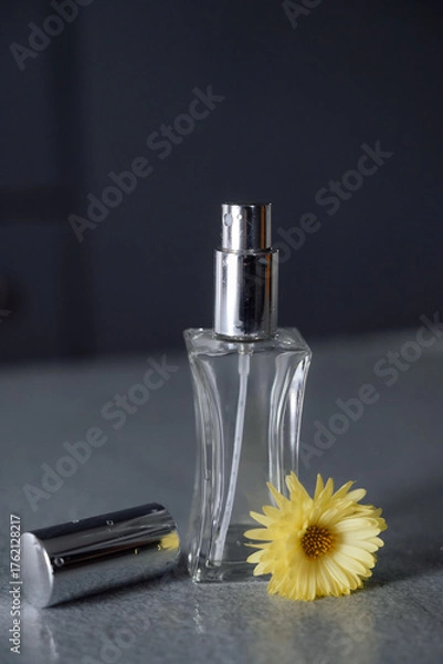 Obraz perfume bottle and flower