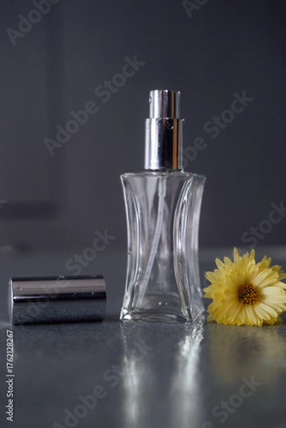 Obraz perfume bottle and flower