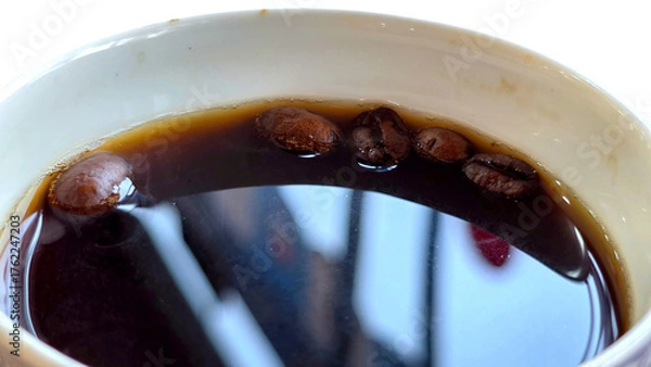 Fototapeta Cup of Black Coffee Isolated on White Background with Copy Text Space. Morning Beverage Concept for Cafes, Menus, and Food Advertisements. PNG File.