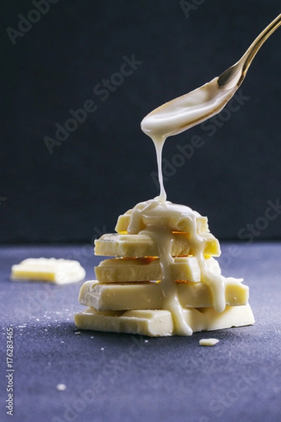 Obraz Pouring icing on white chocolate