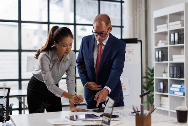 Obraz Conversation, planning and business people in office, finance and coworking to review budget. Employees, staff and accounting firm with cooperation, coaching and mentor with feedback and teamwork

