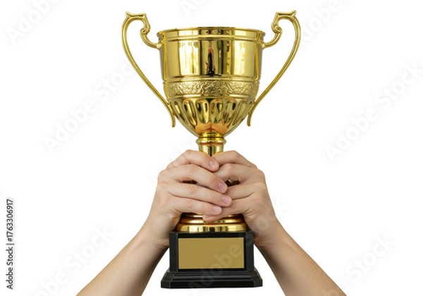Obraz Isolated hands holding up a large, golden trophy cup, in a celebration or winning moment
