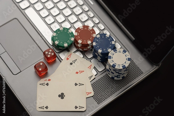 Fototapeta Online Gambling Concept Showing Poker Chips, Cards on Laptop Keyboard