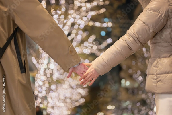 Obraz 手を繋ぐカップル