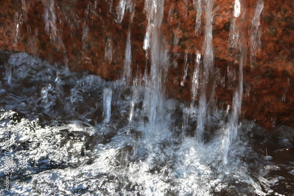Obraz Granite Cascade: Water Dancing under Red Rock