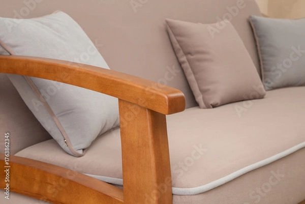 Obraz sofa with wooden armrest