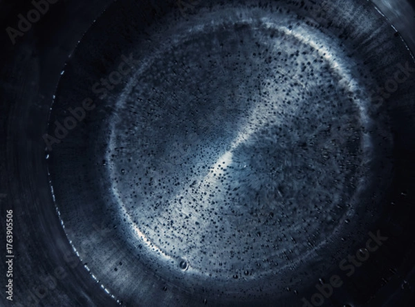 Fototapeta Water is boiling in a pot. Background image close-up