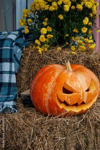 Obraz orange Halloween pumpkin on a haystack